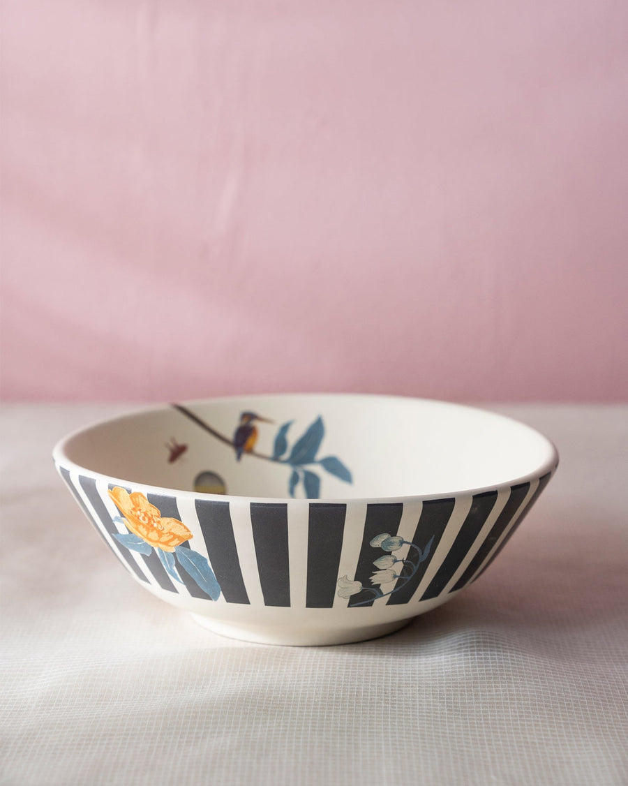 A Myra curry bowl with navy stripes.