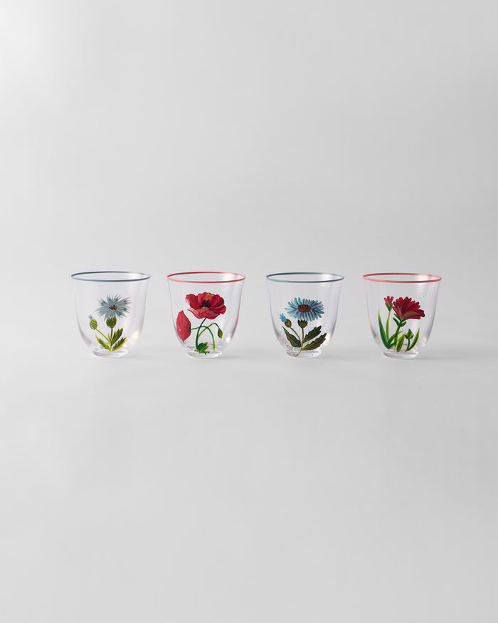 Set of four Rit tumblers with hand-painted daisy, poppy, cornflower, and carnation motifs.