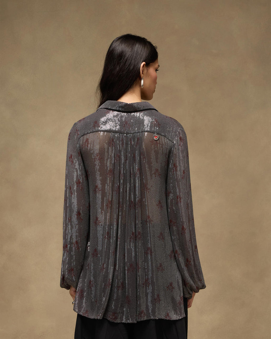Back view of the Bacchus Shirt, with gathers falling from the yoke and a small metal heart coin.