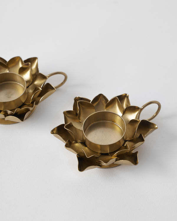 Close view of layered petals round a tealight cup