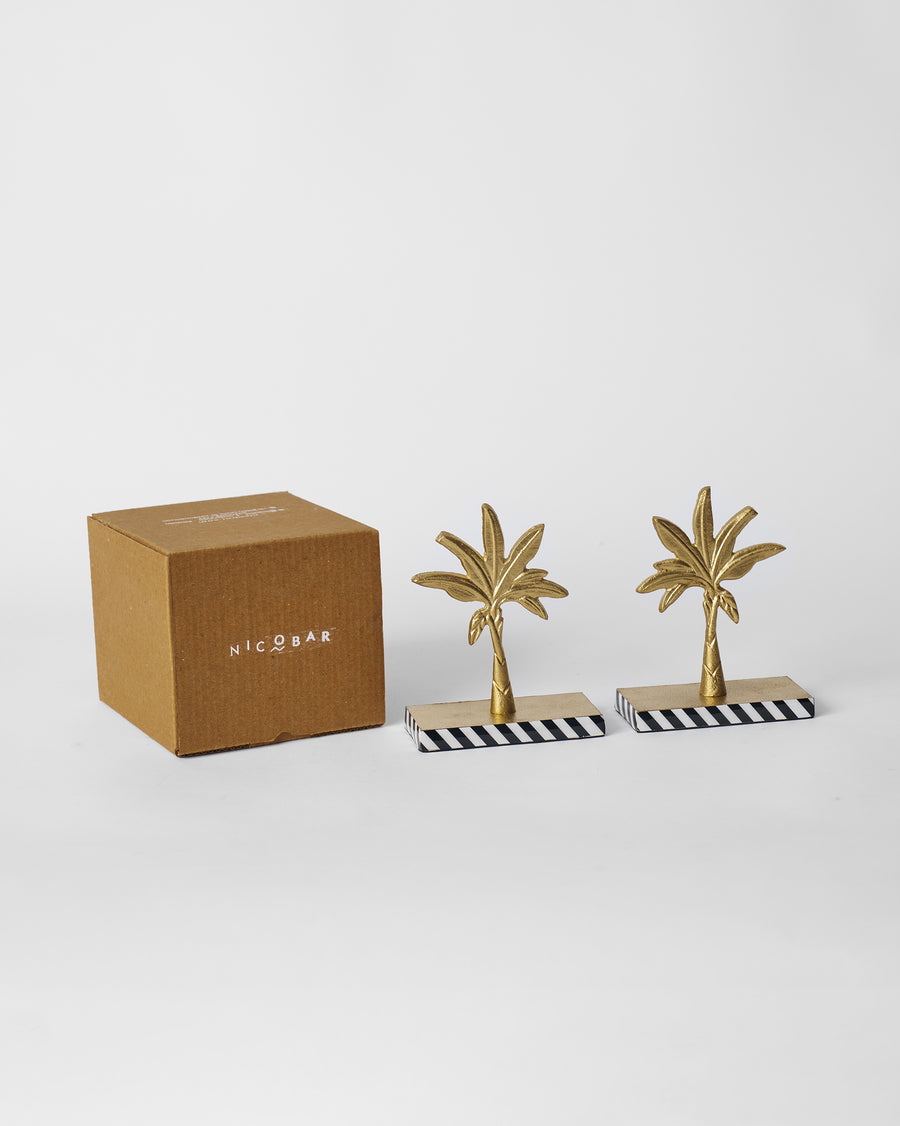The bookends beside their kraft box.