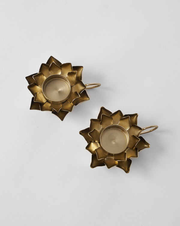 The votives from above with their ring handles