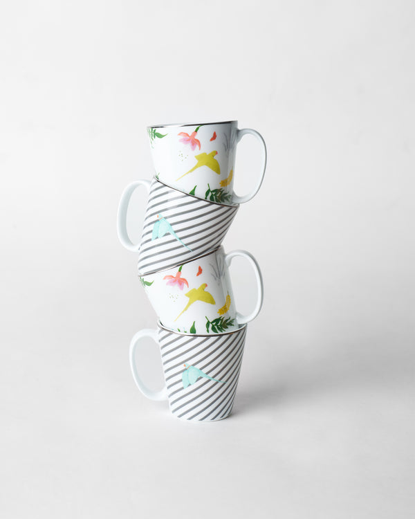 All four mugs stacked in a tower
