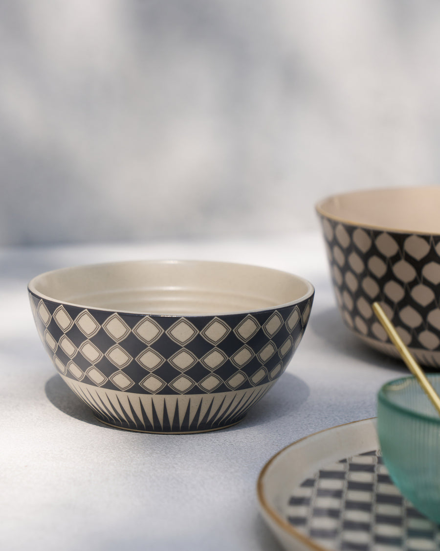 The Fez Cereal Bowl among matching tableware.