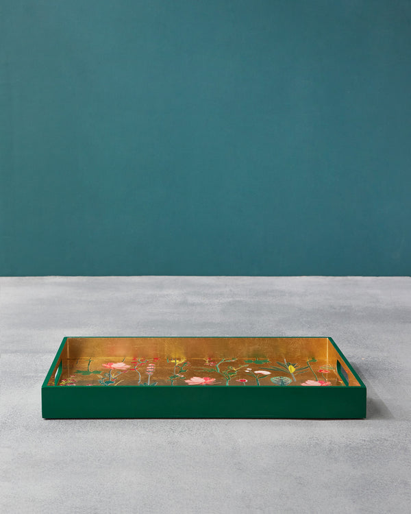 The tray side-on against a teal wall