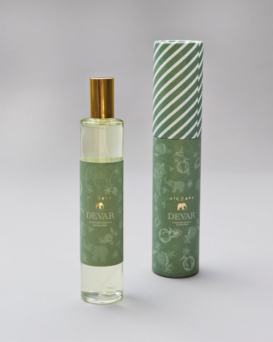 The Devar Room Spray with its striped gift tube.