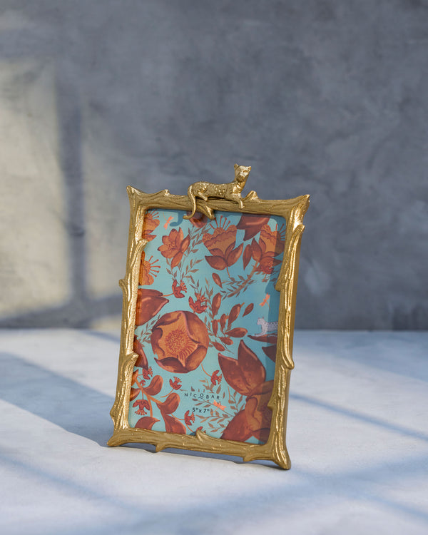 The frame standing, a floral print inside