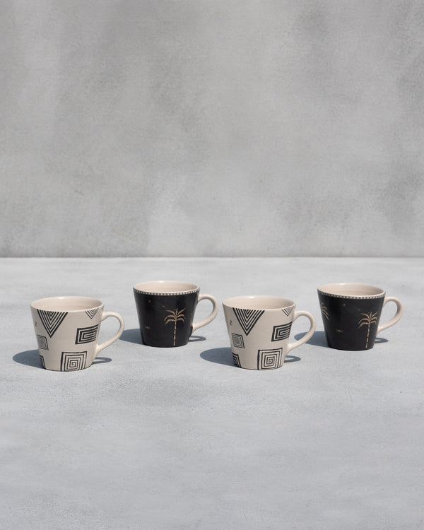 Four mugs in a row