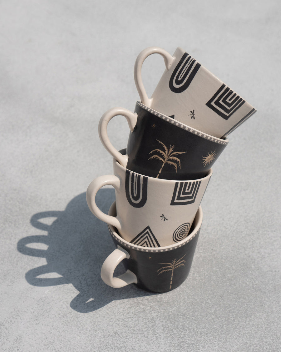 Four mugs stacked, geometric and palm prints