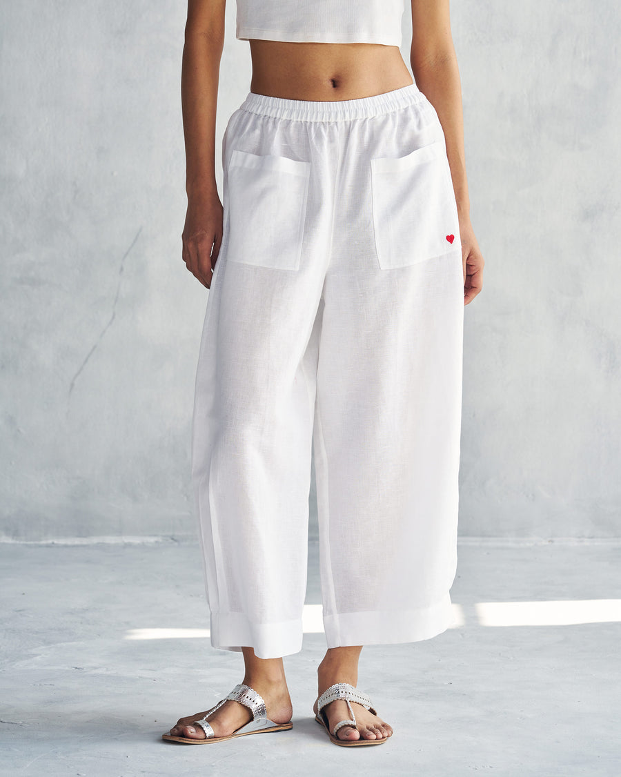 Serene Pants in white, relaxed with patch pockets.
