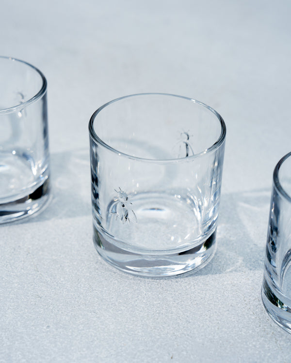Close view of the embossed bee on a glass