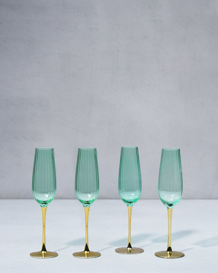 The four flutes in a line, emerald bowls on gold stems