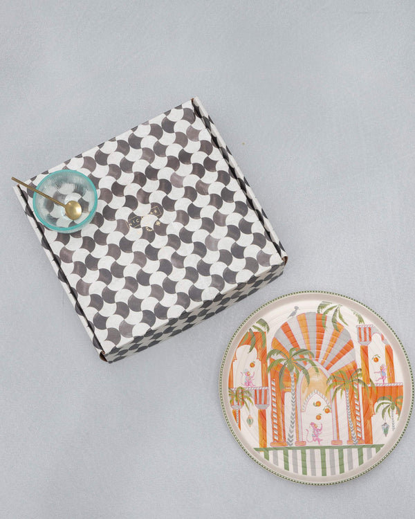 The black and white checked gift box beside the platter