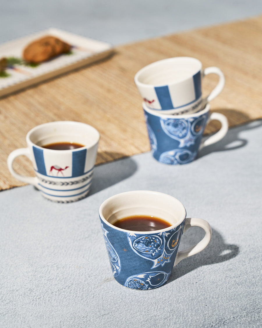 Desert Trail mugs filled with coffee on a jute runner