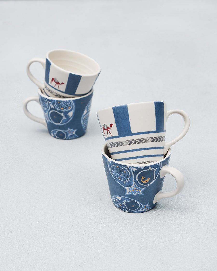Mugs stacked, camel stripes and pomegranates
