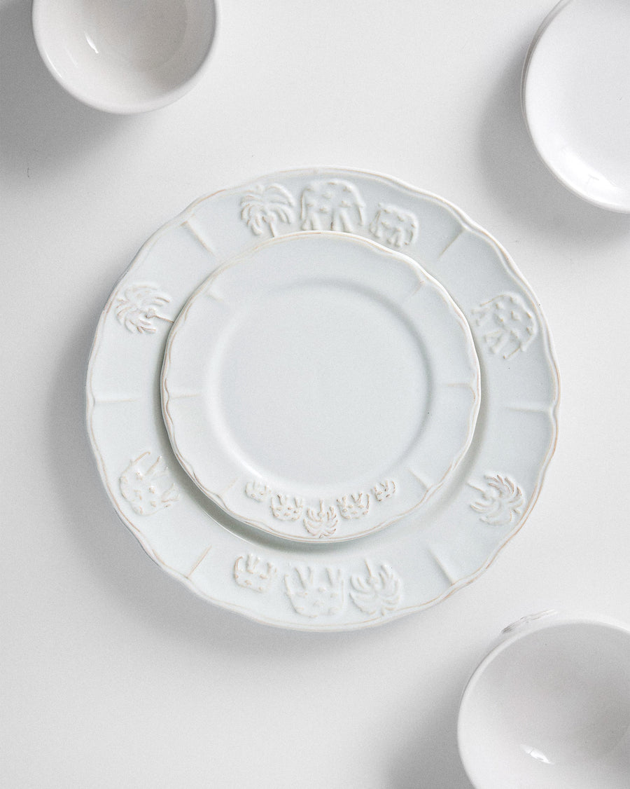 The quarter plate stacked on a dinner plate.