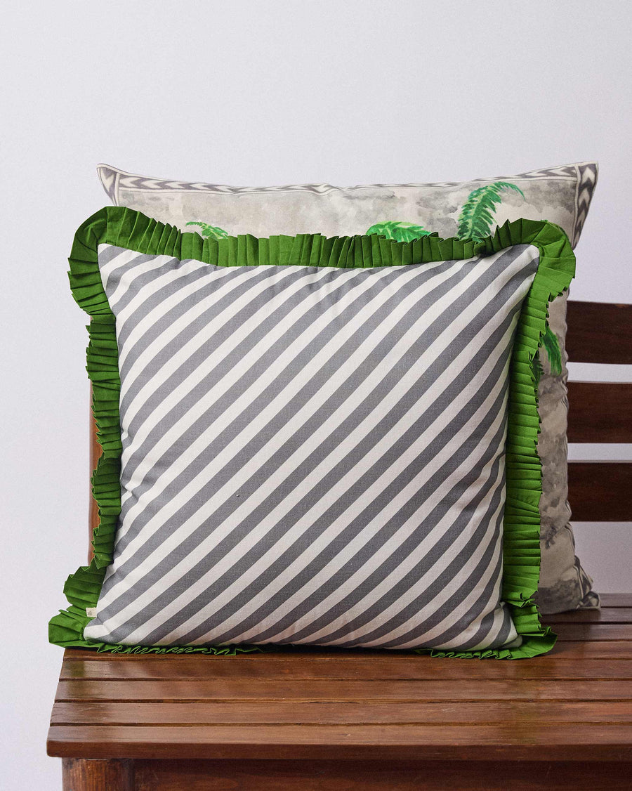 The striped back of the cushion cover.