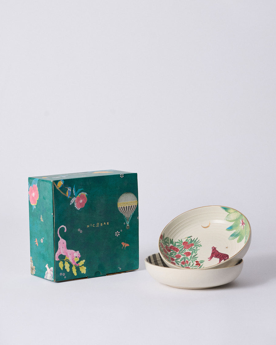 The two bowls stacked beside a teal Nicobar gift box