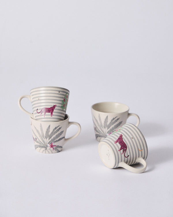 Mugs grouped, one on its side