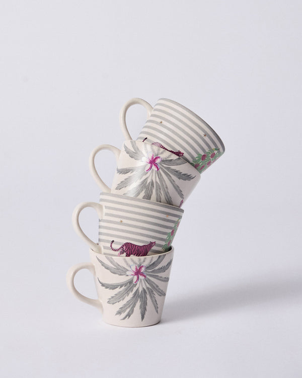 Four mugs stacked in a tower