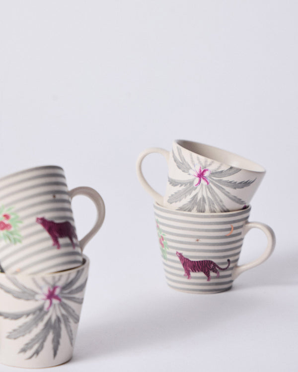 Mugs stacked, palm fronds and a pink tiger