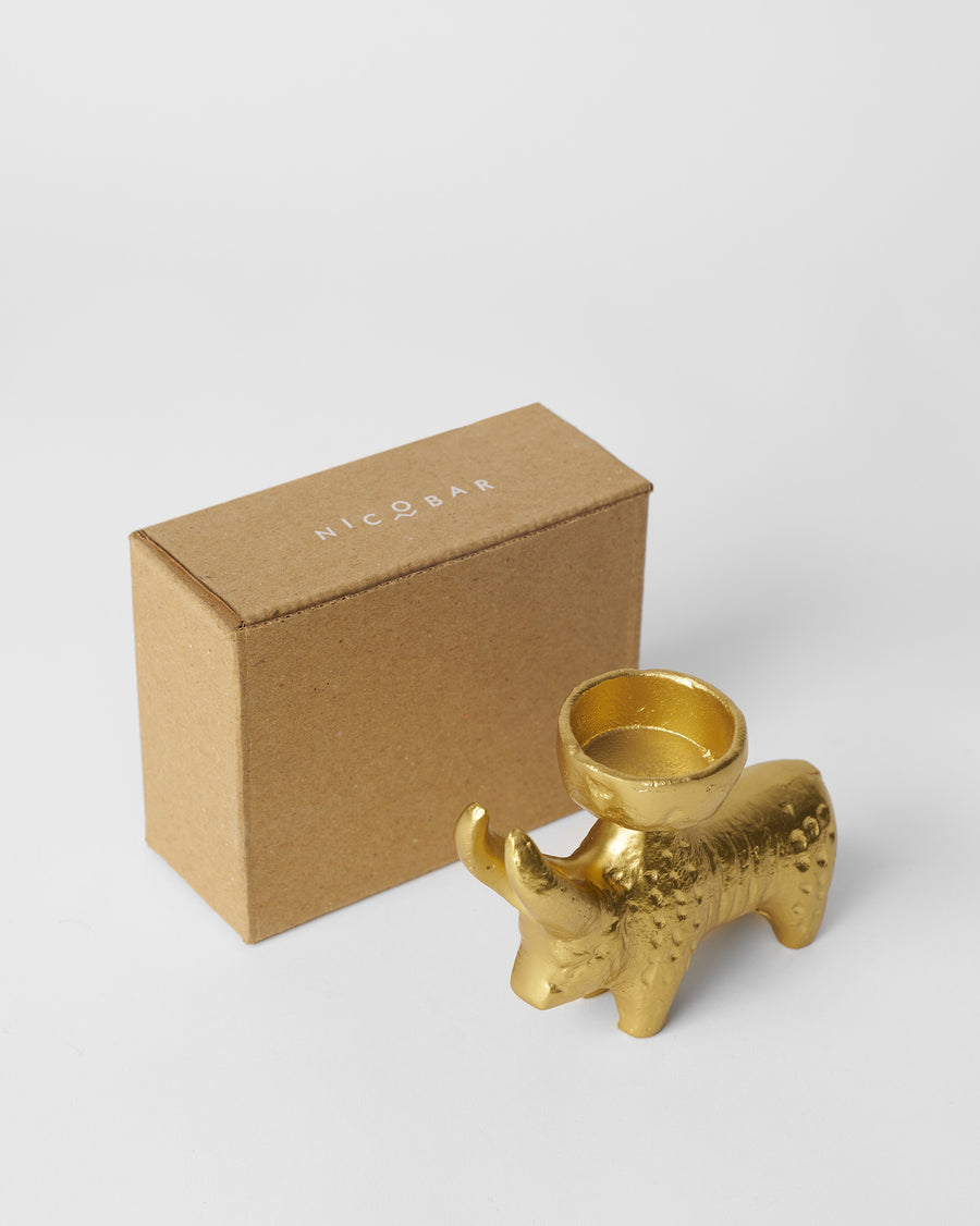 The bull beside its kraft gift box.