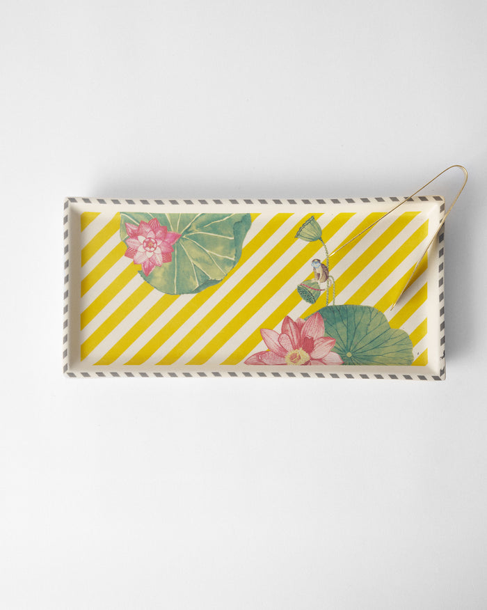 The tray from above with brass tongs