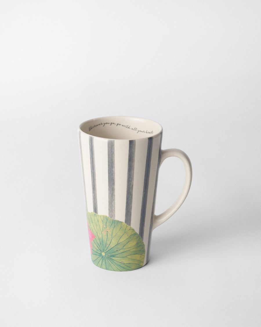 The tall mug on a plain background