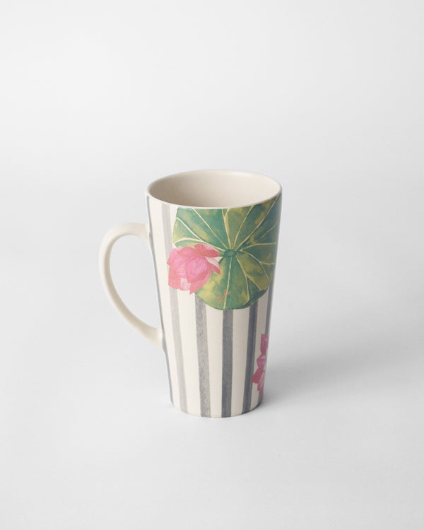The mug with a lily pad and lotus near the top