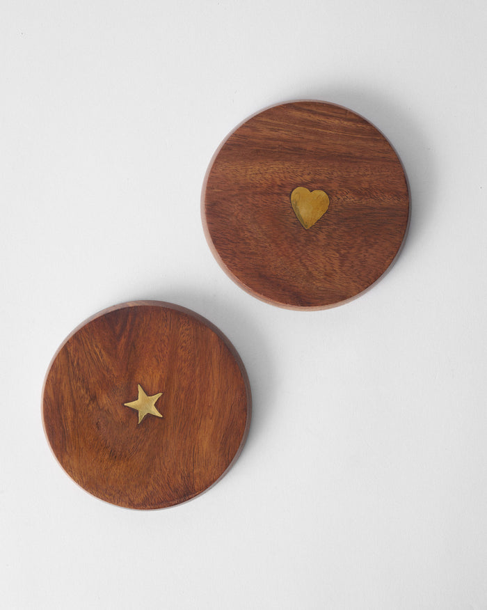 The lids laid flat, star and heart
