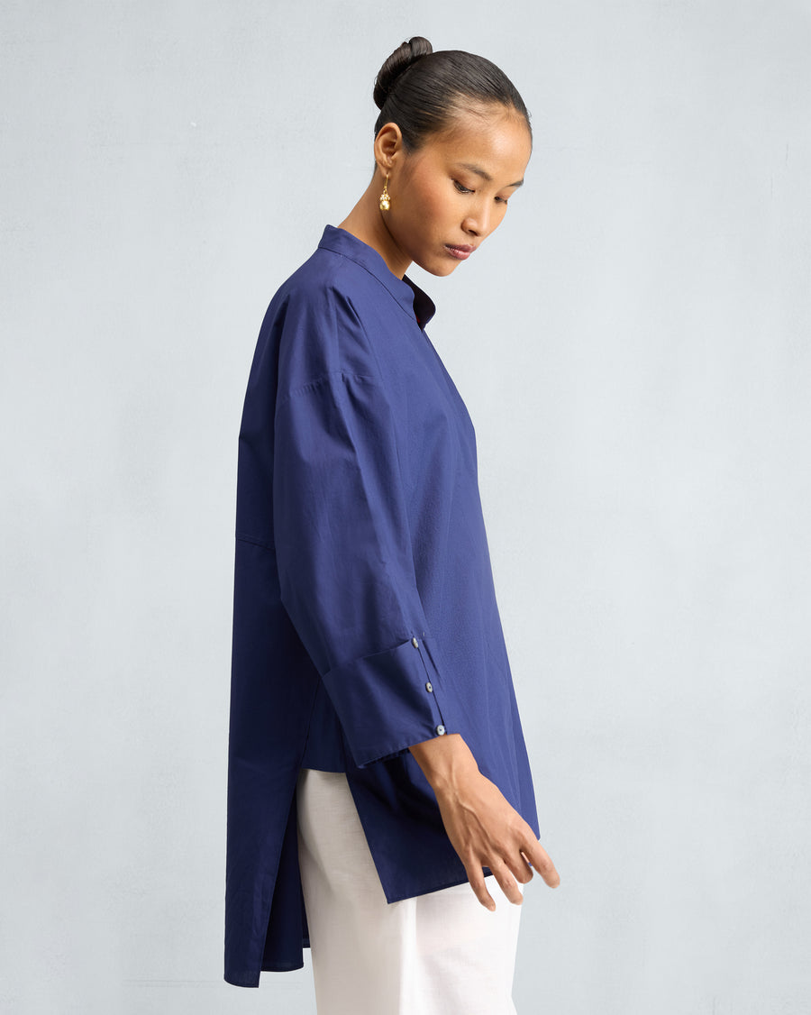 Side view: the hem runs longer at the back.