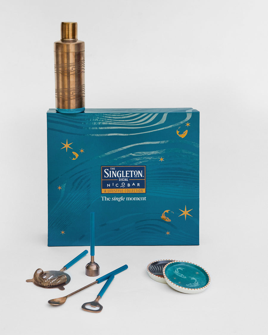 The set beside its teal gift box