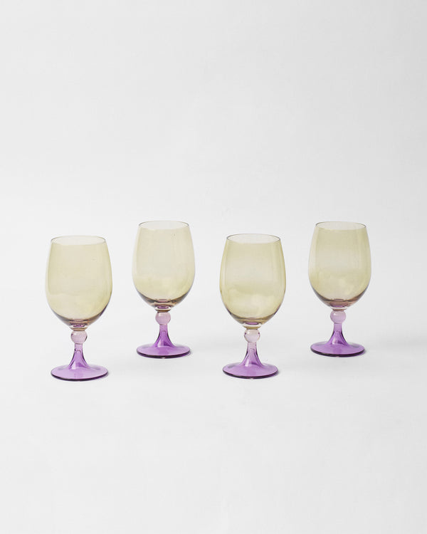 Four goblets in a staggered row
