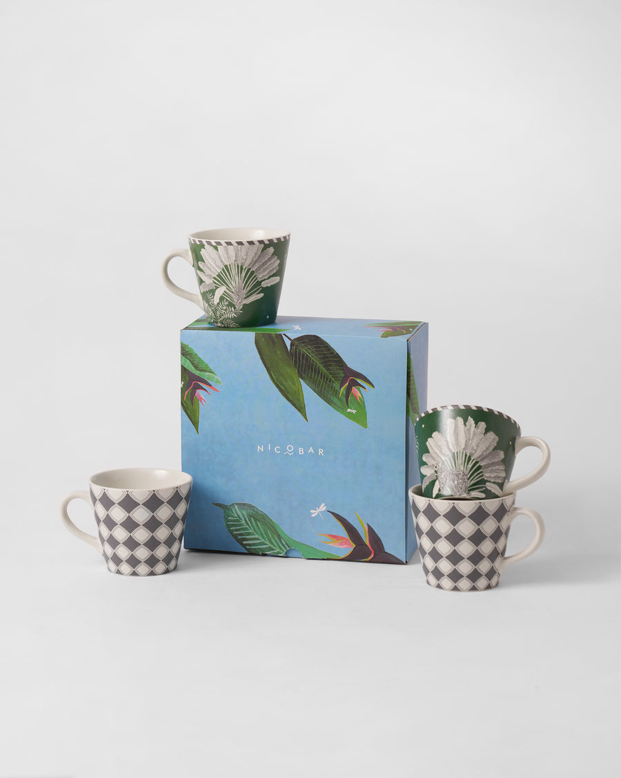 Kandy Espresso Mugs beside their blue tropical gift box.