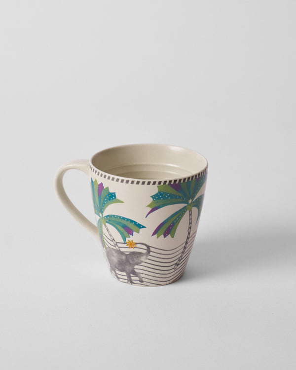 The mug with its handle on the left