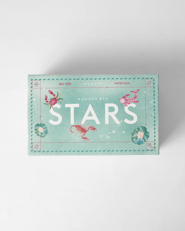 The teal Guided by Stars gift box