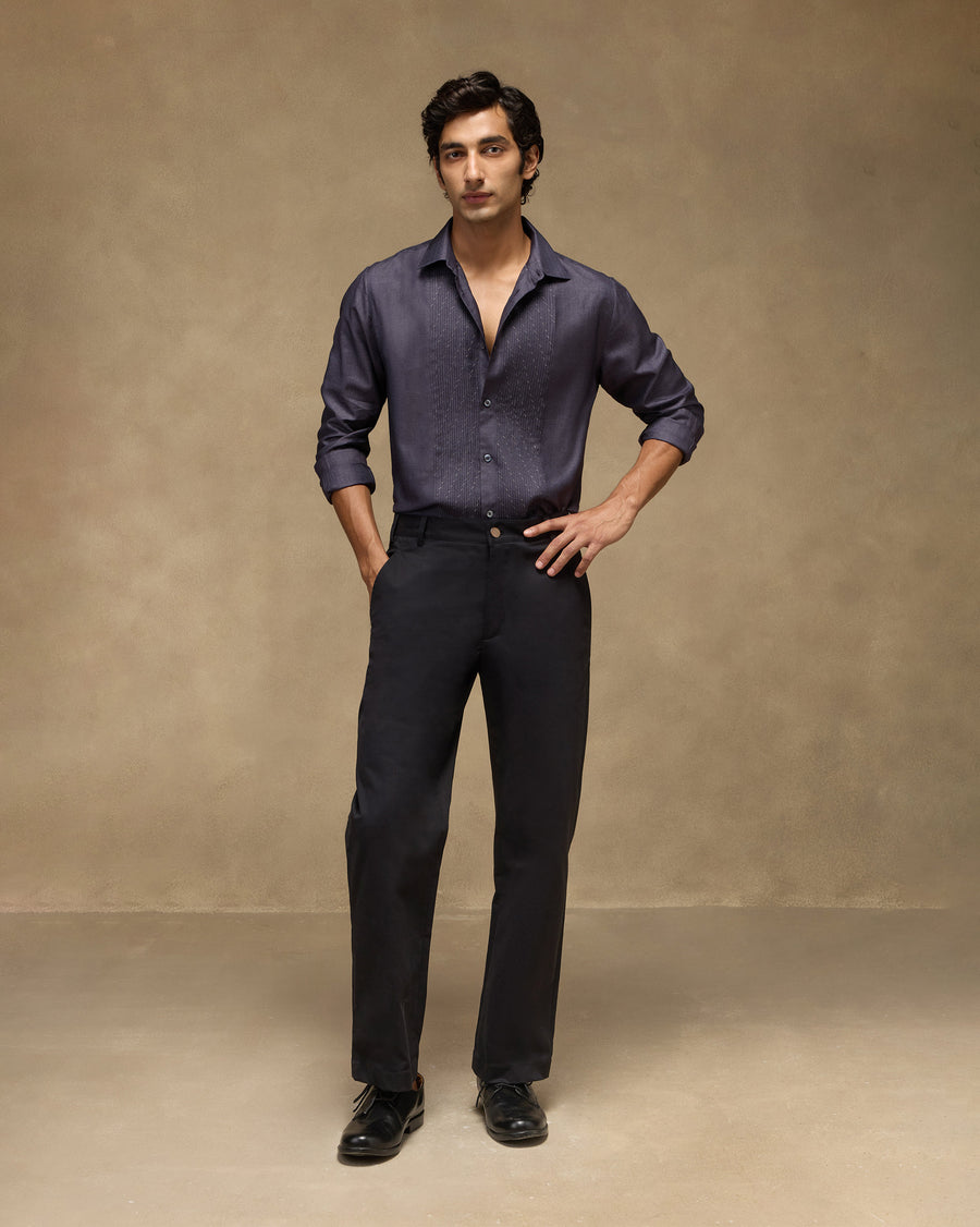 The Afterglow Shirt tucked into the black Panther Trousers, sleeves rolled.