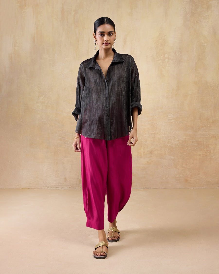 The Firefly Shirt worn with pink Serene Pants and the cuffs rolled.