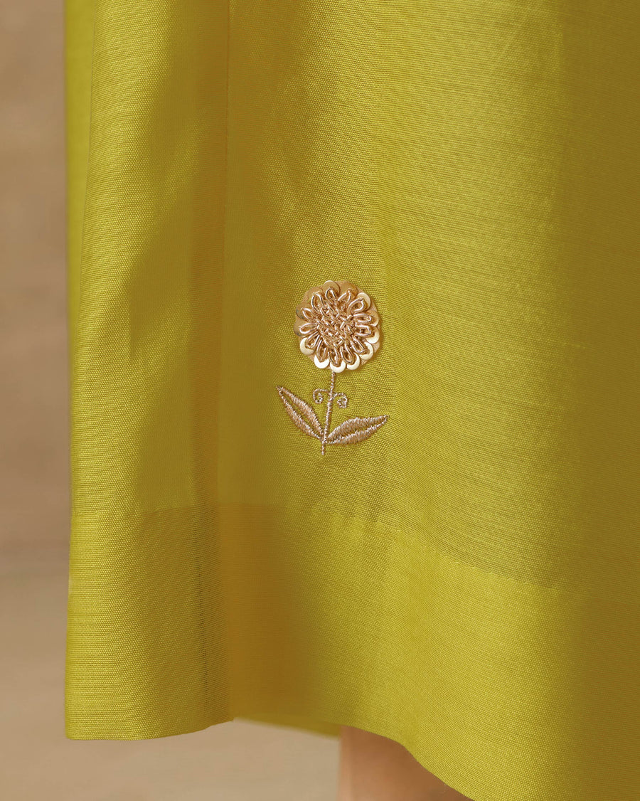 Close-up of the gota chakri flower embroidered at the hem of the Basic Pyjamas.