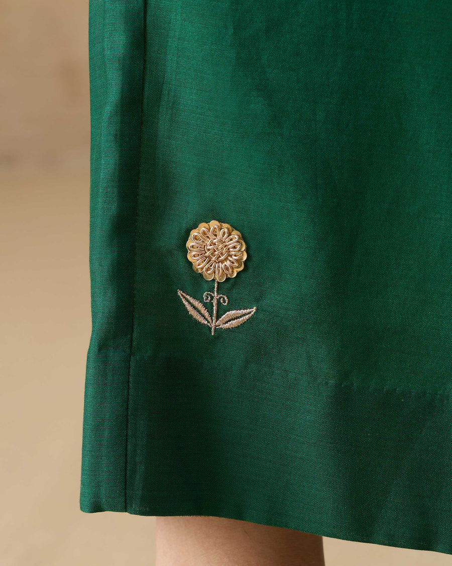 Close-up of the gota chakri flower embroidered at the hem of the Basic Pyjamas.