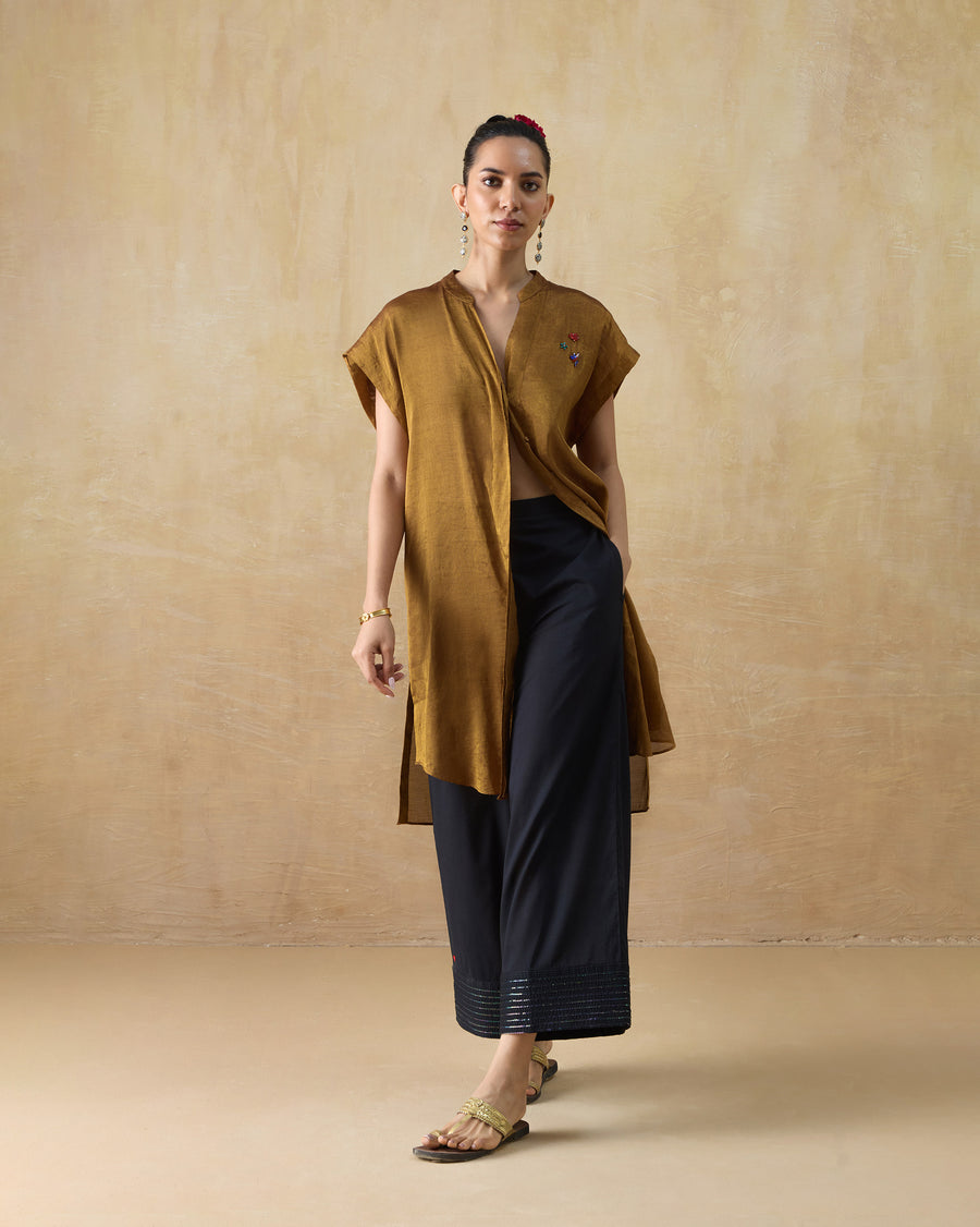 The Tango Kaftan worn open over black Stellar Pants.