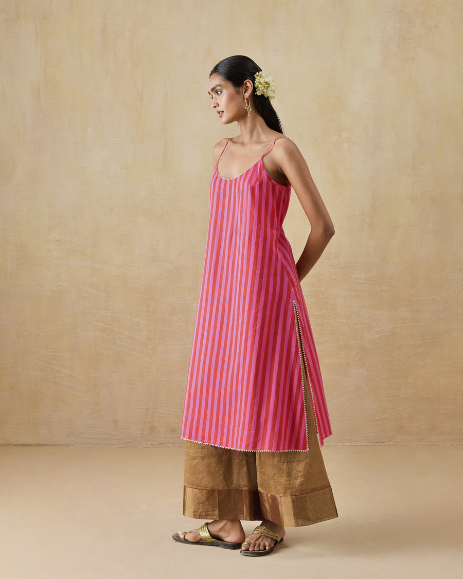 Side view of the Mist Camisole, showing the stripes and the gota-edged hem.