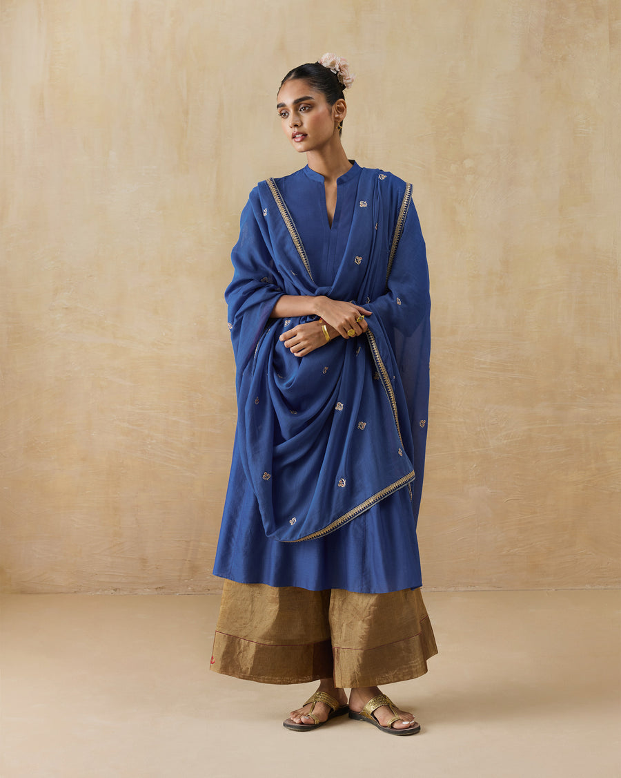 The Leher Dupatta worn over the Moonsong Kurta and gold Charisma Pants.
