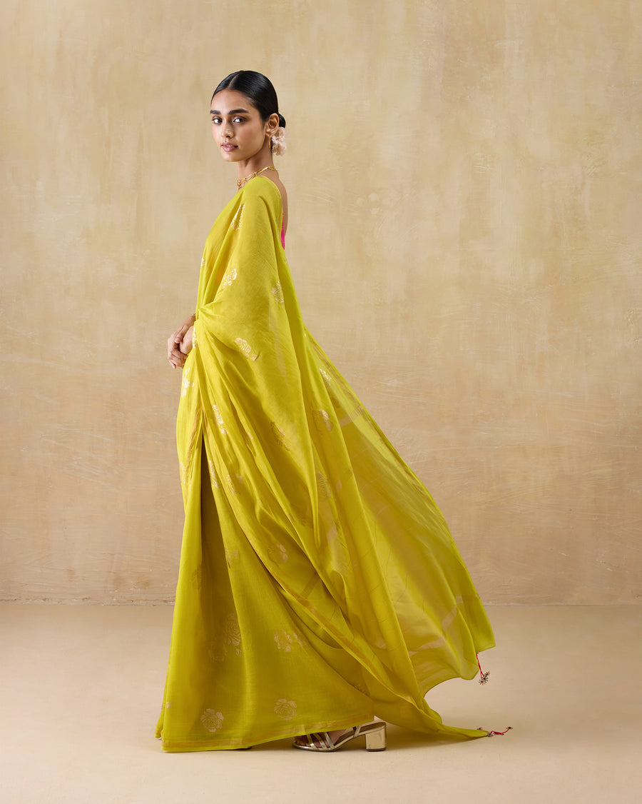 The Sunset Sari in motion, the pallu lifting behind.