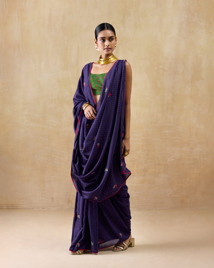 The Midnight Dance Sari seen at an angle, the pallu gathered at the front.