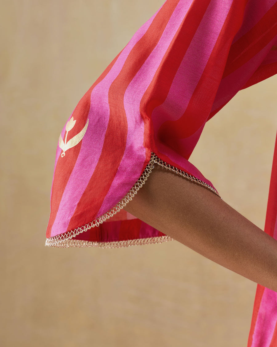 Close-up of the cuff of the Galaxy Kurta, with twisted loop gold lace and a gold foil tulip.