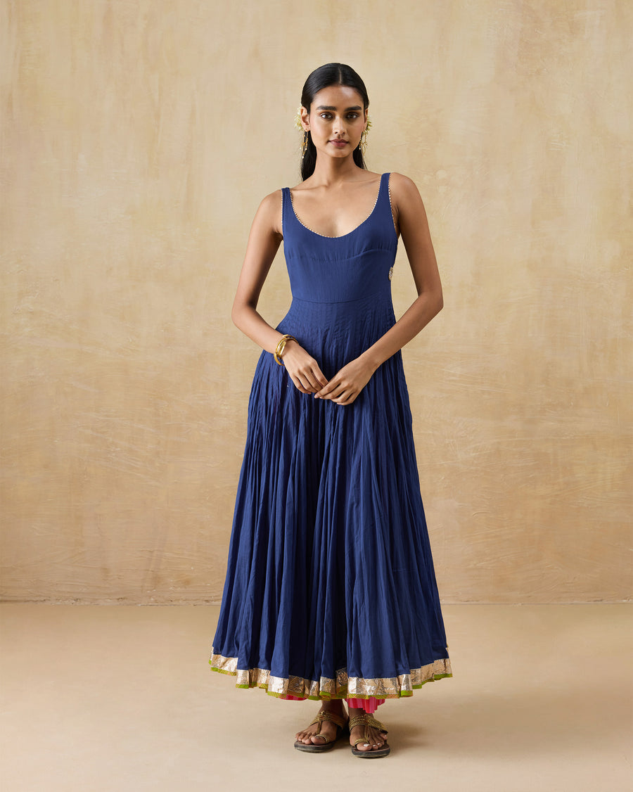 The Kochi Kurta worn over Basic Pyjamas, a flash of pink beneath the hem.