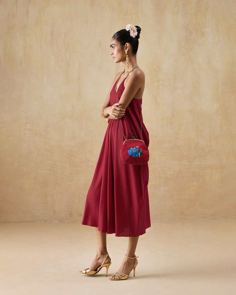 The Savni Dress worn with gold heels and the Sling Clutch.