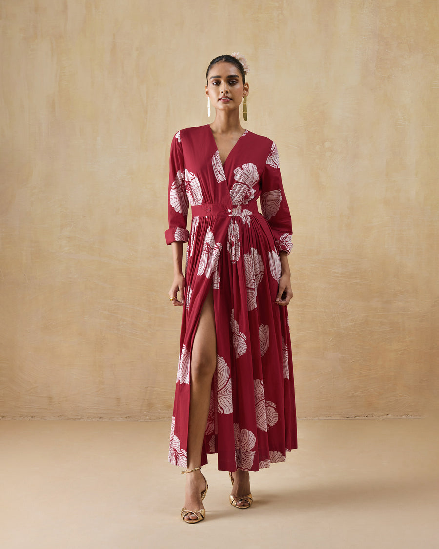 The Nico Dress in motion, the front slit opening and the poppy print running across the skirt.
