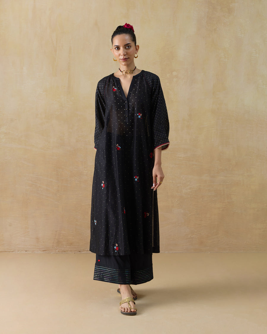 The Stellar Pants worn under the black Moonbeam Kurta.